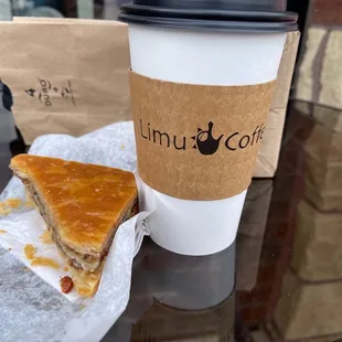 a piece of pie and a cup of coffee