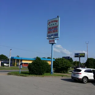 a car parked in front of a restaurant