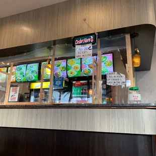 a view of a restaurant counter