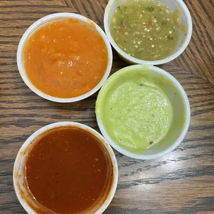Their 4 salsas - all delicious! (Orange one is SPICY!)