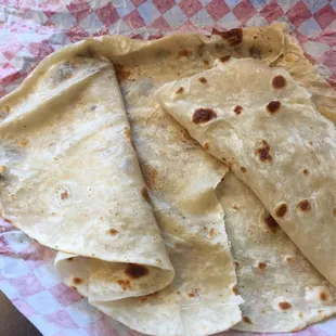 Flour tortillas are hot, fresh and home made.