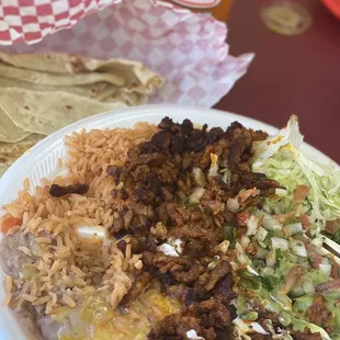 Adobada Plate with flour tortilla and Jarritos Mandarin