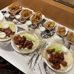 BOMB FOOD wings onion rings chicken nuggets