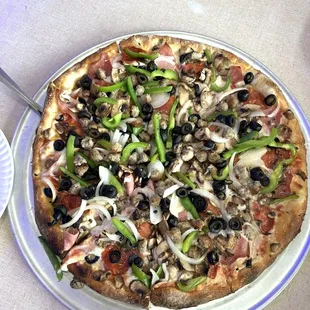 Linbrook Large Deluxe Pizza well done.