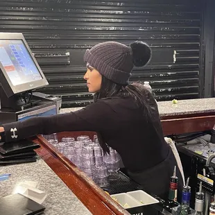 a woman at the bar