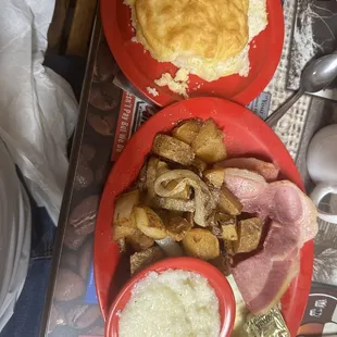 Hungry Jack with country ham, potatoes, grits, and a side biscuit. Missing a pancake in the pic
