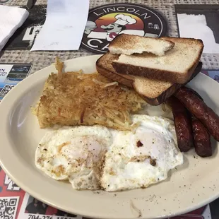 Two eggs over easy, Hashbrowns, sausage links