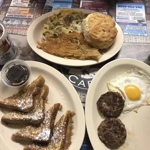 Philly Cheese Steak Omelette, hash brown, biscuit, French toast, turkey sausage and a fried egg. So tasty