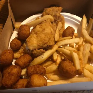 a box of fried chicken and french fries