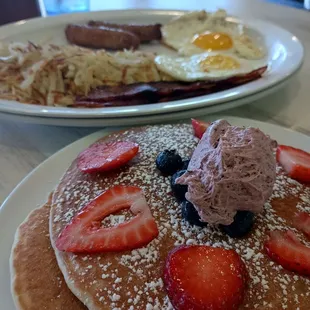 Platter with blueberry pancakes.