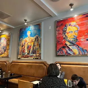 a group of people eating at a restaurant