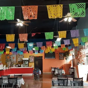 I love all the vibrant colors and festive decorations!