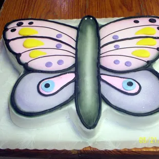a butterfly shaped cake
