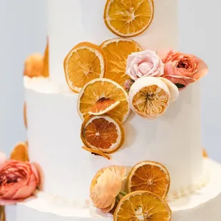 a cake decorated with orange slices