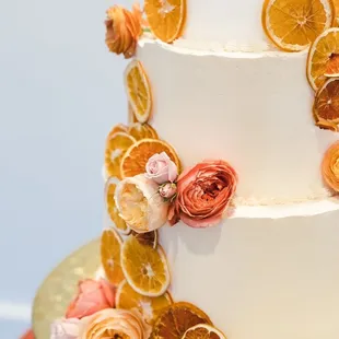 a cake decorated with orange slices