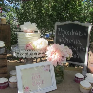  wedding cake and cupcakes