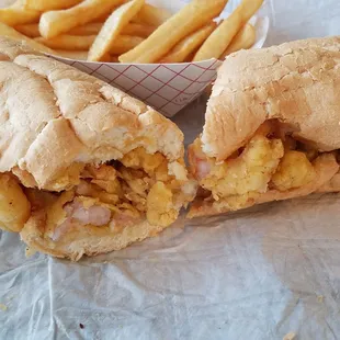 Shrimp poboy and fries. Hmmmm taste like home.
