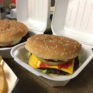 two burgers and french fries