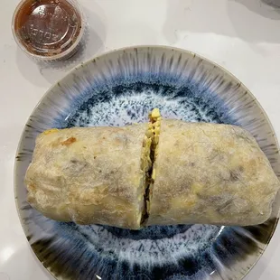 Bacon breakfast burrito with salsa