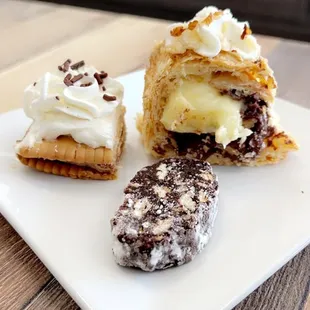 three desserts on a plate