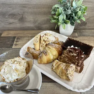 a plate of pastries and a cup of coffee