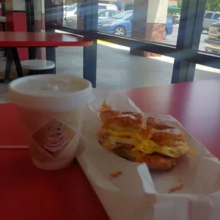 Breakfast croissant and small coffee.