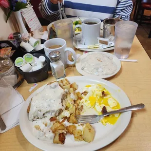 Country fried steak with biscuits and gravy...yummmy