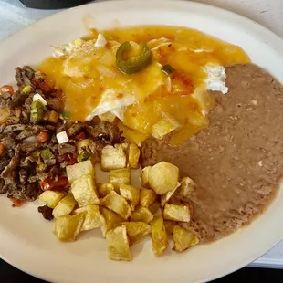 Huevos rancheros with carnitas a La mexicana