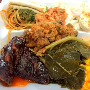 Box from the buffet:  fried chicken livers, BBQ ribs, collards, mac 'n' cheese, kim chee, tofu, seafood salad, deviled egg, cold noodles