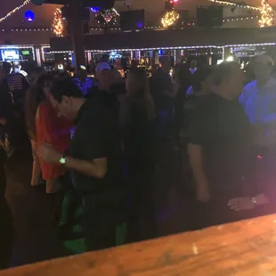 a crowd of people at a party