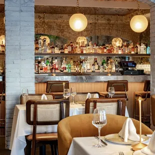 Take a seat at the bar, where the vibrant energy of the city meets the laid-back charm of a local hangout.
