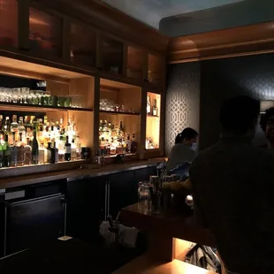 people sitting at the bar