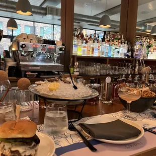 Burgers, drinks, and oysters.
