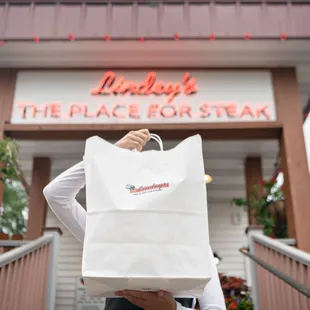 a woman holding a bag