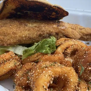 Fish sandwich with curly fries