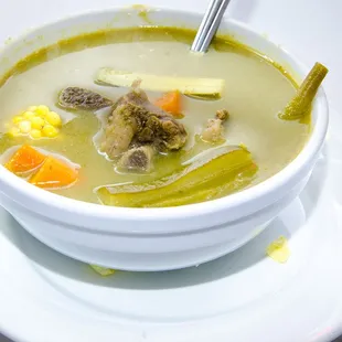 a bowl of soup on a plate