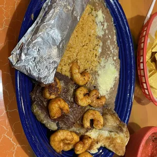 a plate of food and a drink