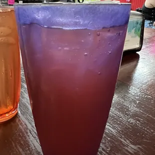 a purple and orange drink