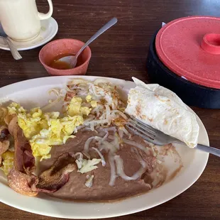 Scrambled eggs w/bacon, hashbrowns, beans &amp; fresh tortillas