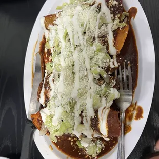 Enchiladas de mole y pollo