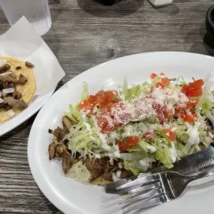Huaraches with carnitas and a asada street taco because my eyes are bigger than my stomach!