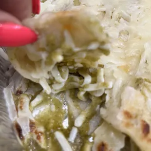 Cheese (supposed to be chicken and cheese) enchiladas.