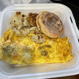 Turkey lovers omelette with potatoes and English muffin