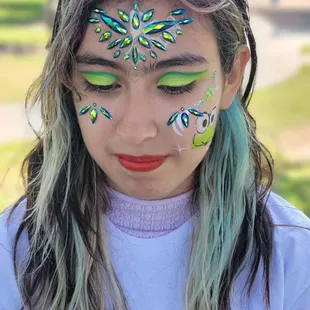 Jeweled applications, makeup and face painting.