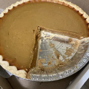 My under-stuffed pumpkin pie, with the crust looking more machine perfect than small town bakery excellence.