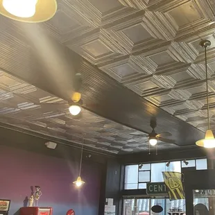 Metal ceiling tiles; other decor keep the nostalgia feeling while here