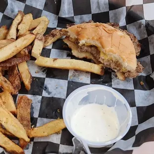 Plain burger with American and a side of fries with ranch.