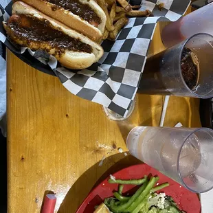 Chili dogs , reg 1/2 fries , Greek salad w pita