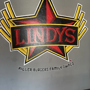 the logo on the wall