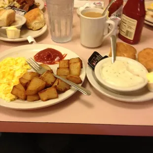Country Boy Favorite 2 eggs, home fries, biscuits and gravy with a ham steak (posted on the next pic)